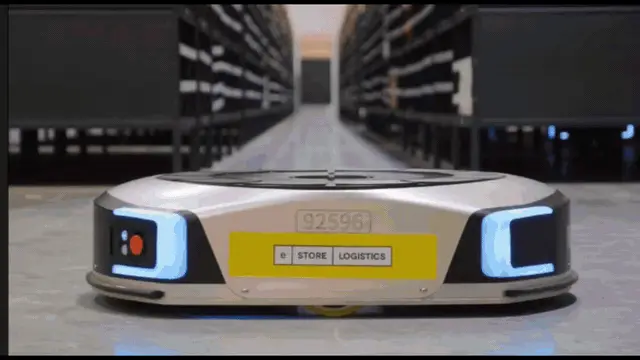 Geek+ autonomous mobile robot in a warehouse aisle