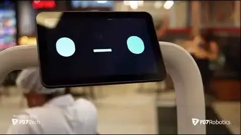 Pudu service robot at work in a shopping mall